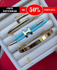 Ekser, Love, svetlo plava Lora narukvica u boji zlata.