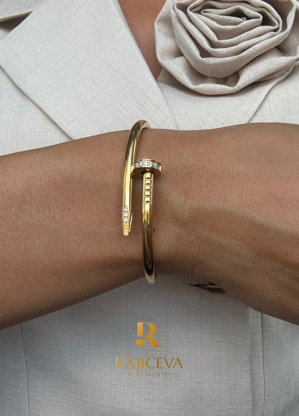 Ekser zlatna narukvica sa cirkonima