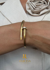 Ekser zlatna narukvica sa cirkonima