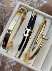 Ekser, Love, Lora zelenoj narukvice u boji zlata