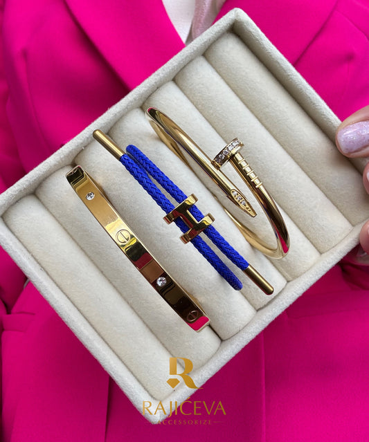 Ekser, Love, tamno plava Lora narukvice u boji zlata.